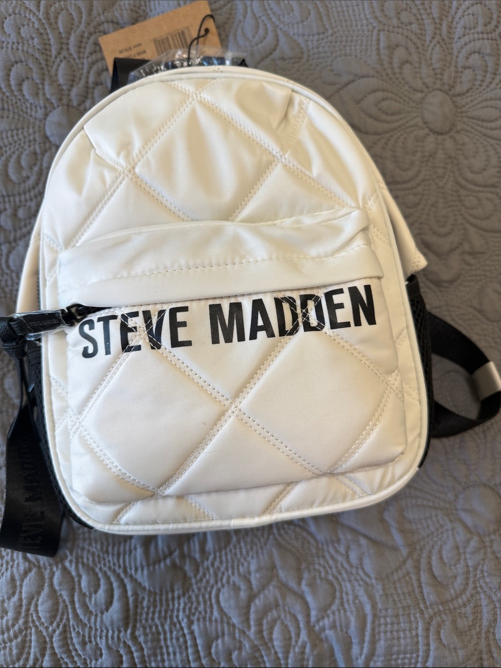 Steve Madden Cream Quilted Mini Backpack with Black Logo Script